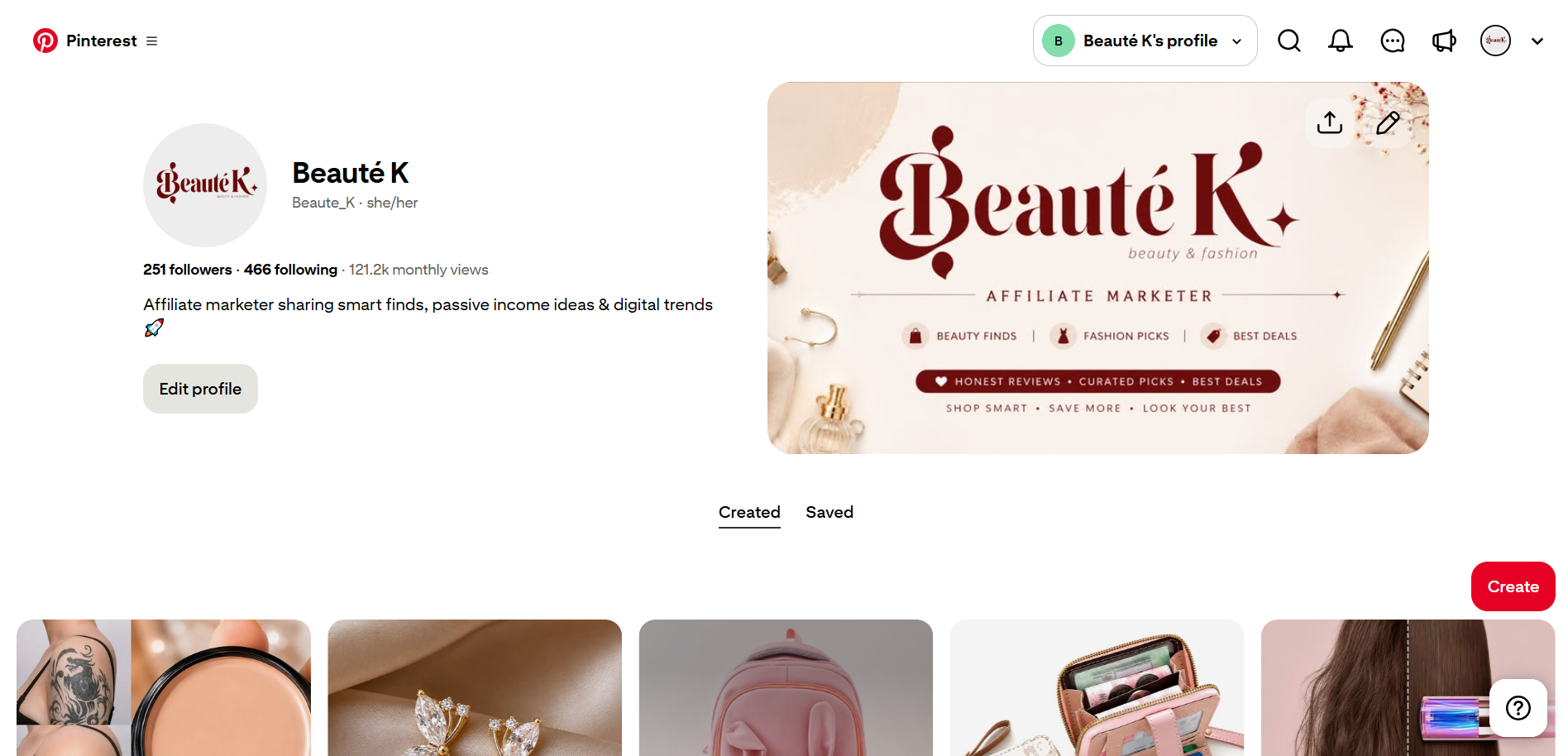 Pinterest Business Account profile showing optimized profile name, bio, followers, monthly views, and organized Pins